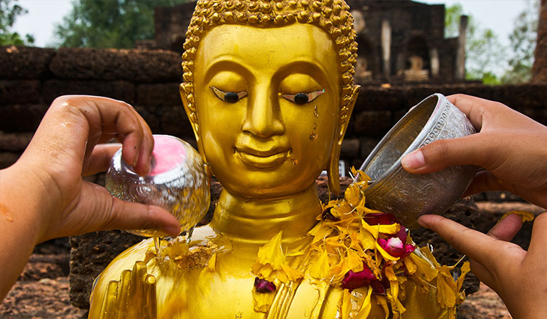 Buddha Cleansing at Songkran, Thailand